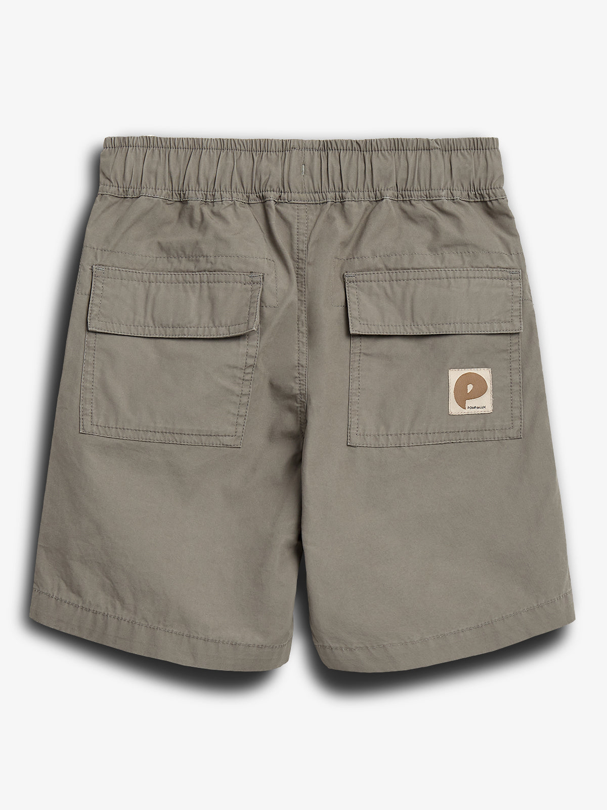 Khaki shorts with an elastic waistband have two flap pockets on the back. A small beige and brown patch features the letter "P" and the word "patch."