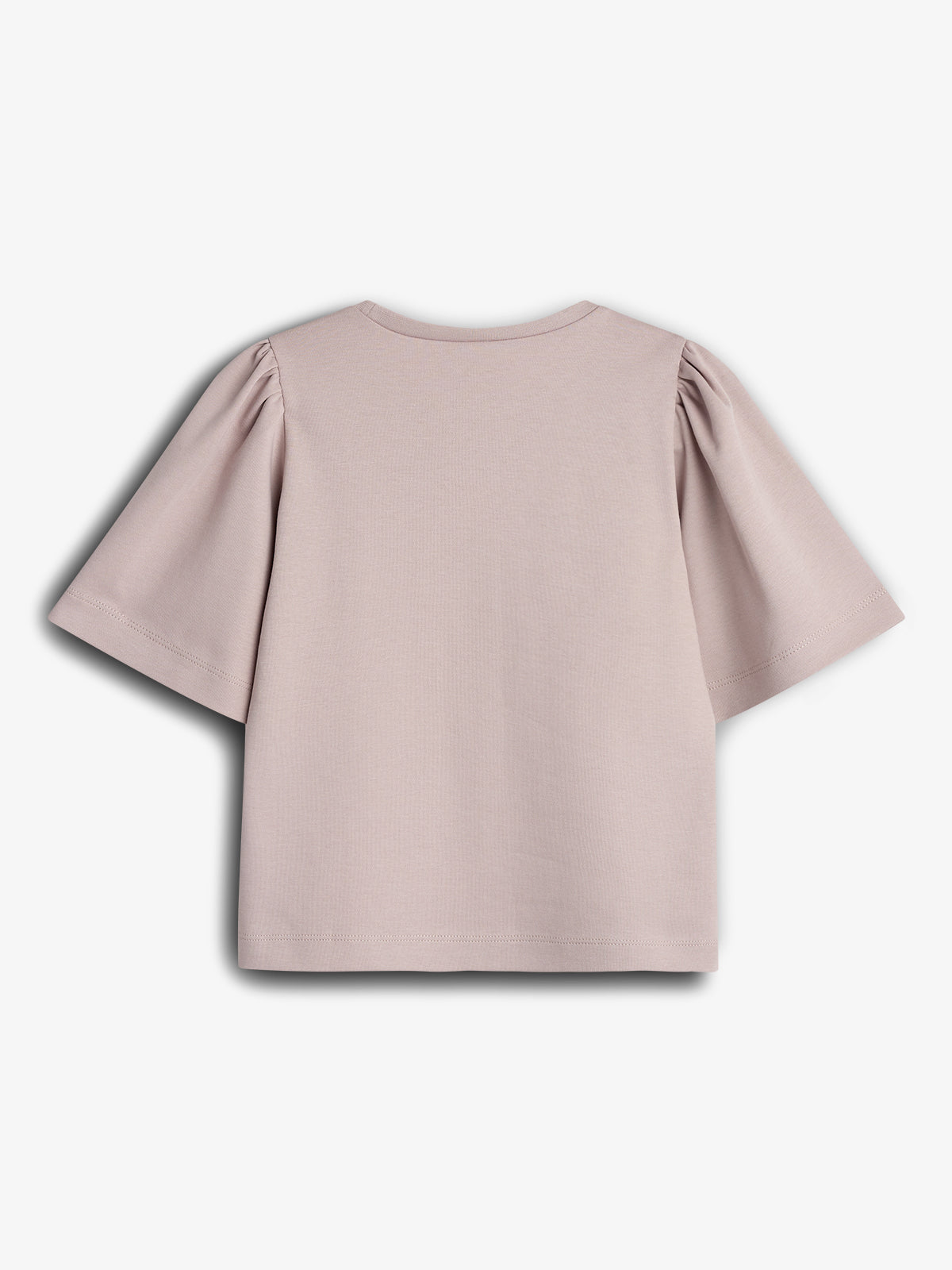 A pastel pink t-shirt with short, slightly puffed sleeves hangs against a plain white background, showcasing its back view.