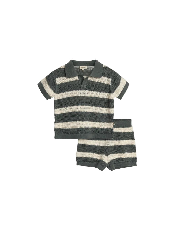 A knitted outfit features a short-sleeved collared shirt and shorts with green and white stripes. The label inside the shirt reads "pamelacute." Both pieces have a textured, open-knit design.