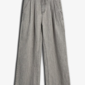 Wide-leg, light gray denim pants are displayed against a plain white background. The pants feature pleats near the waistband and side pockets.