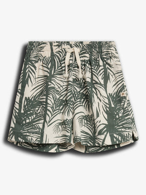 Shorts with a drawstring waistband feature a green palm leaf pattern against a beige background, positioned on a plain white surface.