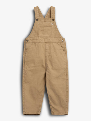 Tan overalls with adjustable straps and front pocket displayed against a white background; features side buttons and a straight-leg design.