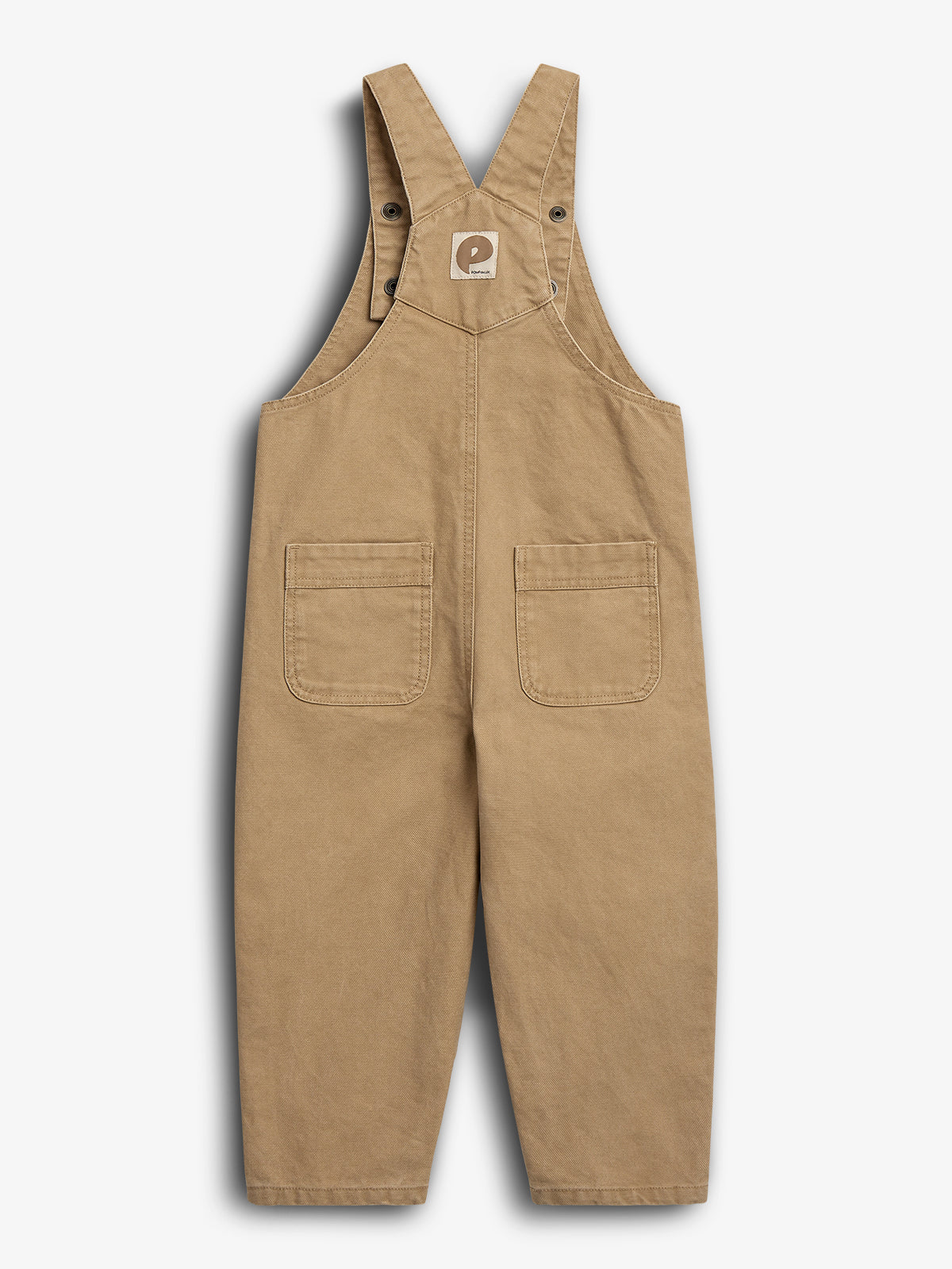 Brown overalls hang against a plain white background. The overalls feature two front pockets and buttoned shoulder straps. A square logo patch with a stylized "P" is centered on the chest.