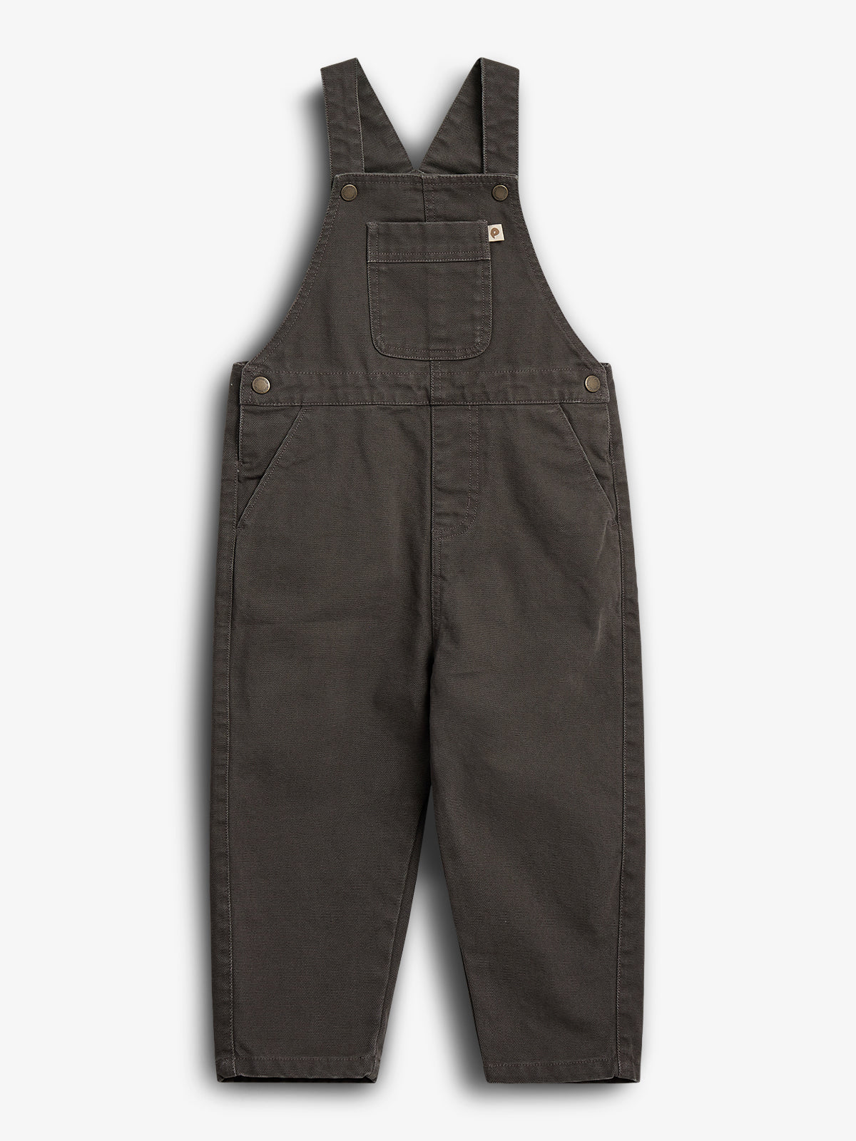 Dark brown children's overalls lie flat against a white background, featuring adjustable straps, a chest pocket, and side pockets secured with metal buttons.