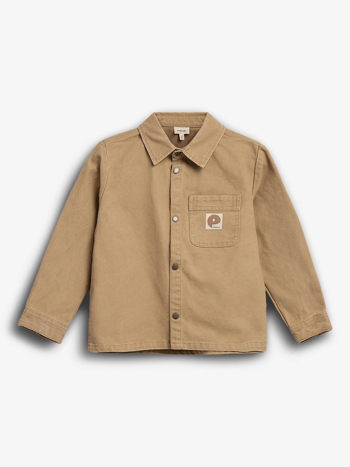 Tan jacket with a collar and buttoned front is displayed on a white background. A small chest pocket on the left features a square patch with a stylized "P" and the word "Patagonia".