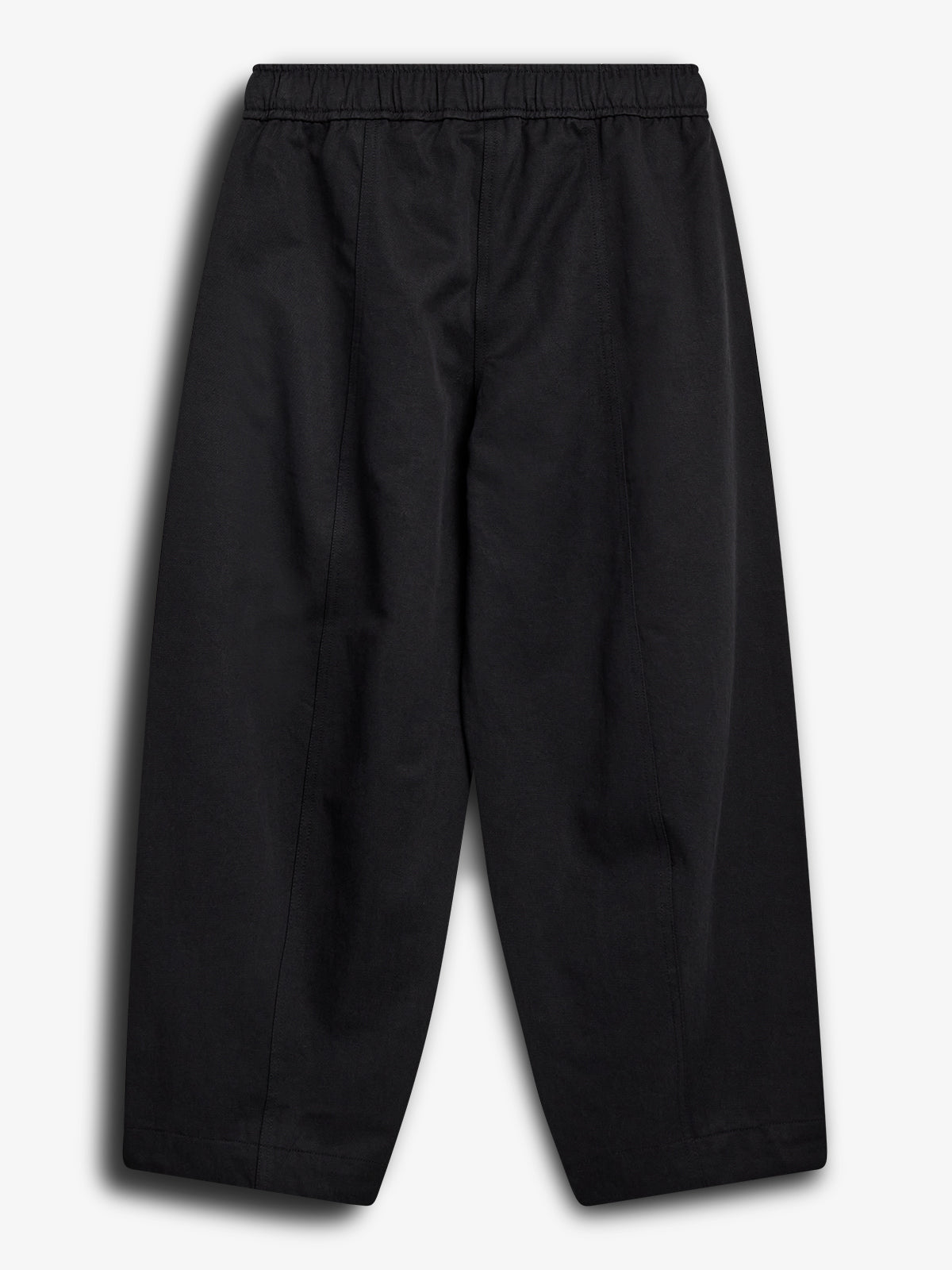 Black pants are displayed against a plain white background. The pants have an elastic waistband and straight legs with a loose fit, emphasizing simplicity and comfort.