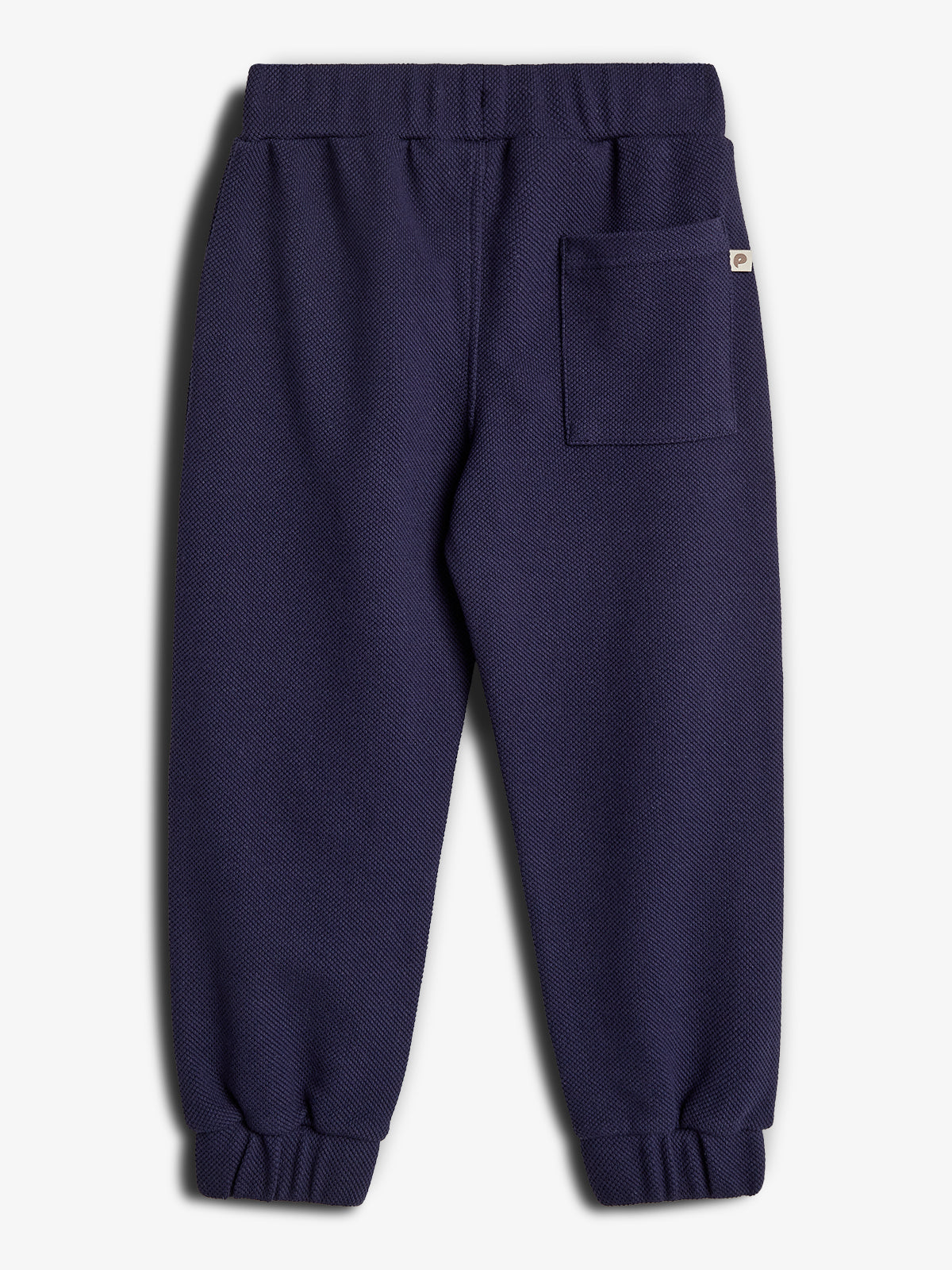 Dark blue pants with an elastic waistband and ankle cuffs, featuring a single back pocket. Displayed against a plain white background.