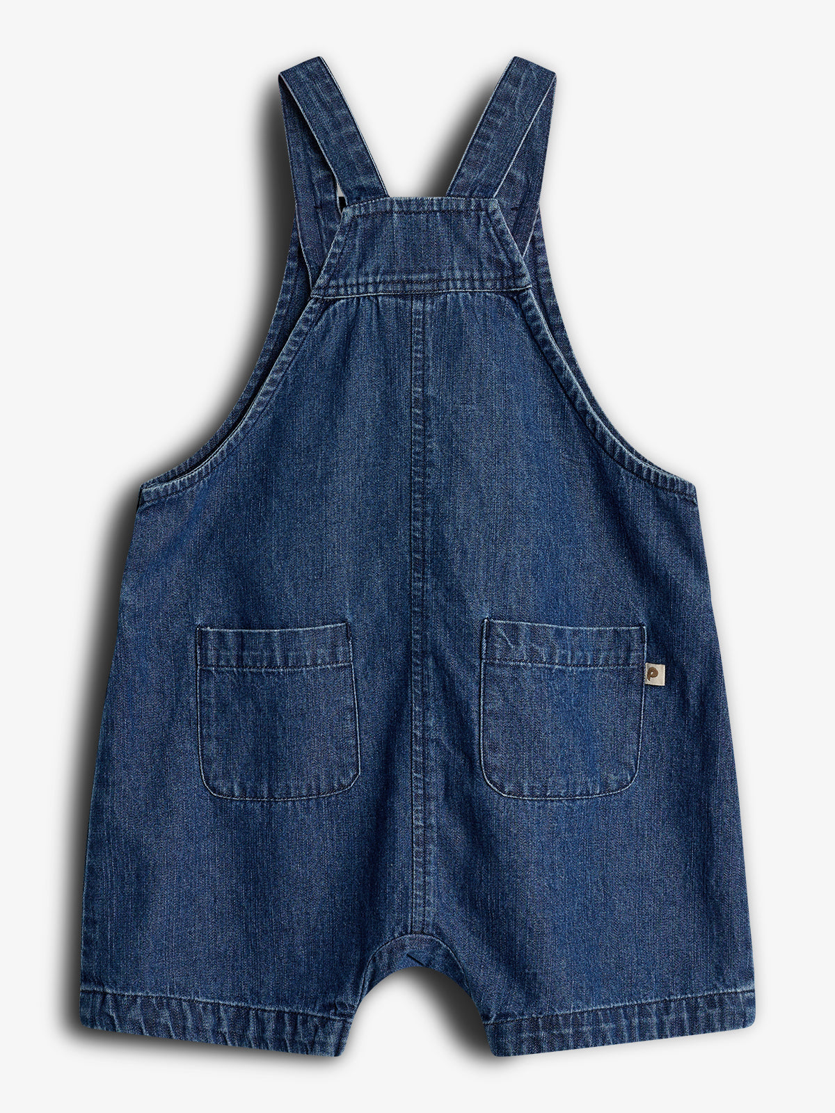 Denim overall features two pockets on the front, with adjustable shoulder straps against a plain white background, highlighting its casual design.