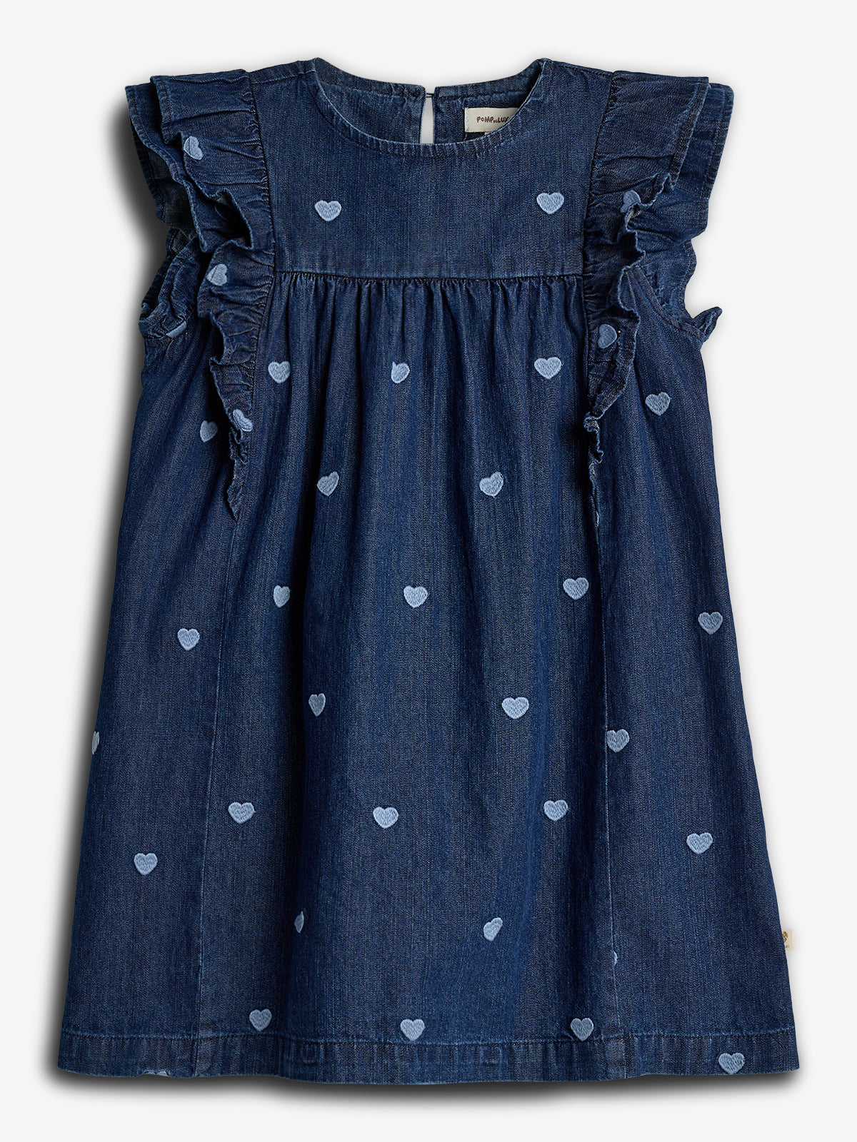 Denim dress features ruffled sleeves and a pattern of embroidered light blue hearts, set against a white background. The label inside reads "Primark."
