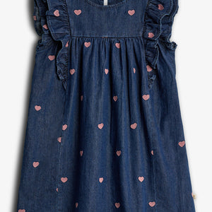 Dark denim dress features embroidered pink hearts and ruffled sleeves. It hangs flat against a white background. The label reads "POMPdeLUX" at the neck.