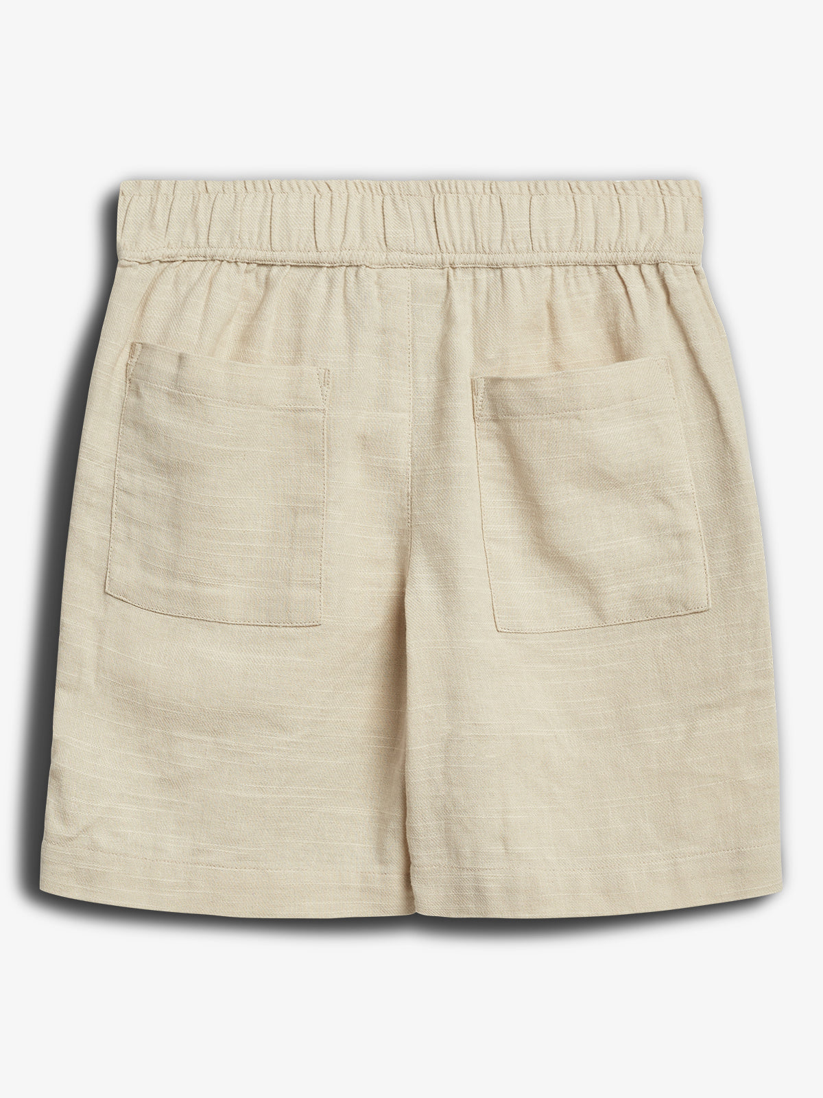 Beige linen shorts with two back pockets and an elastic waistband, placed against a plain white background.