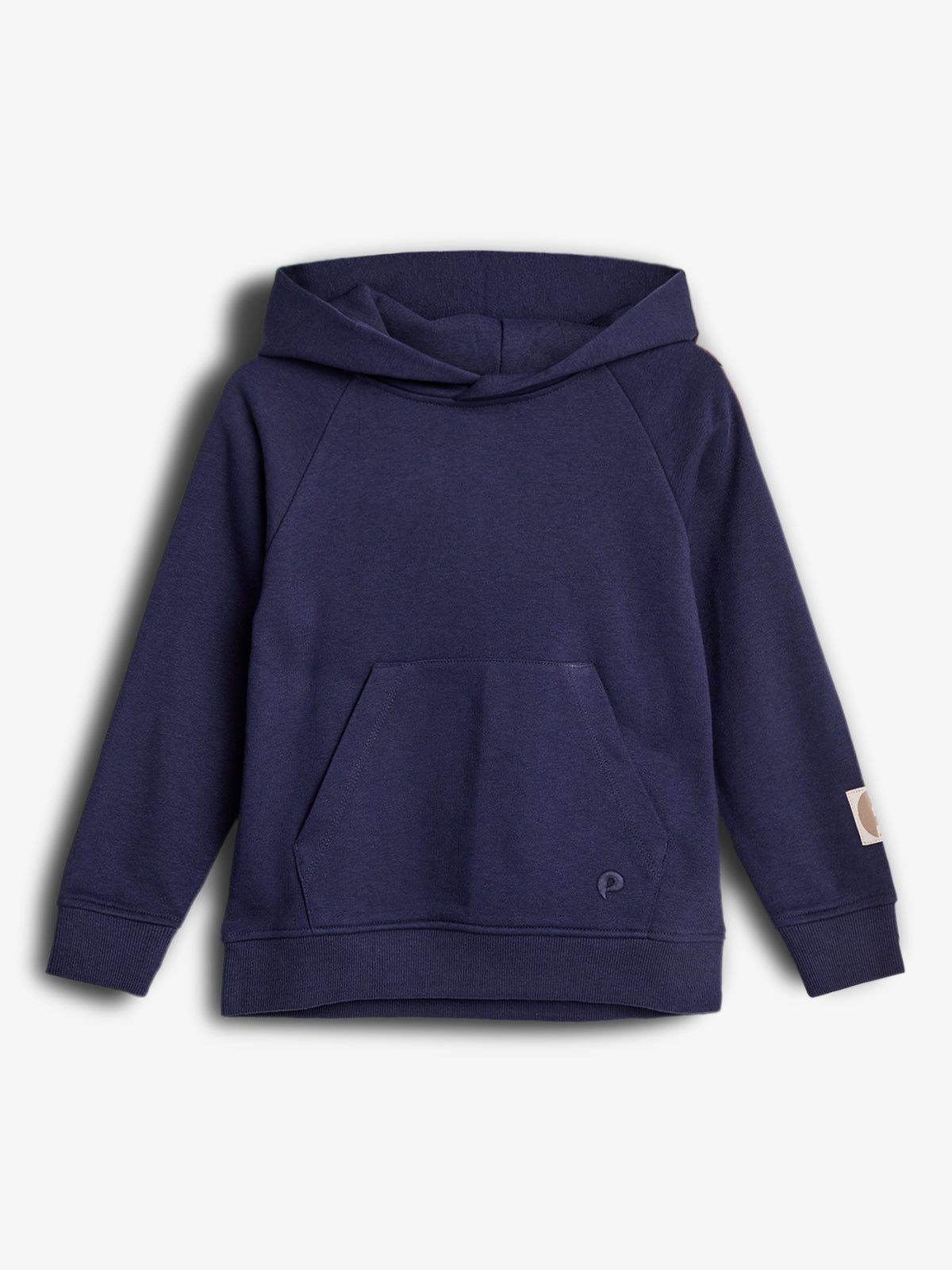 A navy blue hooded sweatshirt features a kangaroo pocket, raglan sleeves, and ribbed cuffs. It has a subtle logo embroidered near the pocket and a patch on the sleeve, set against a plain white background.