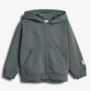 A gray zip-up hoodie with a hood and front pockets displayed against a plain background. There is a small logo on the left pocket. The left sleeve has a fabric tag.