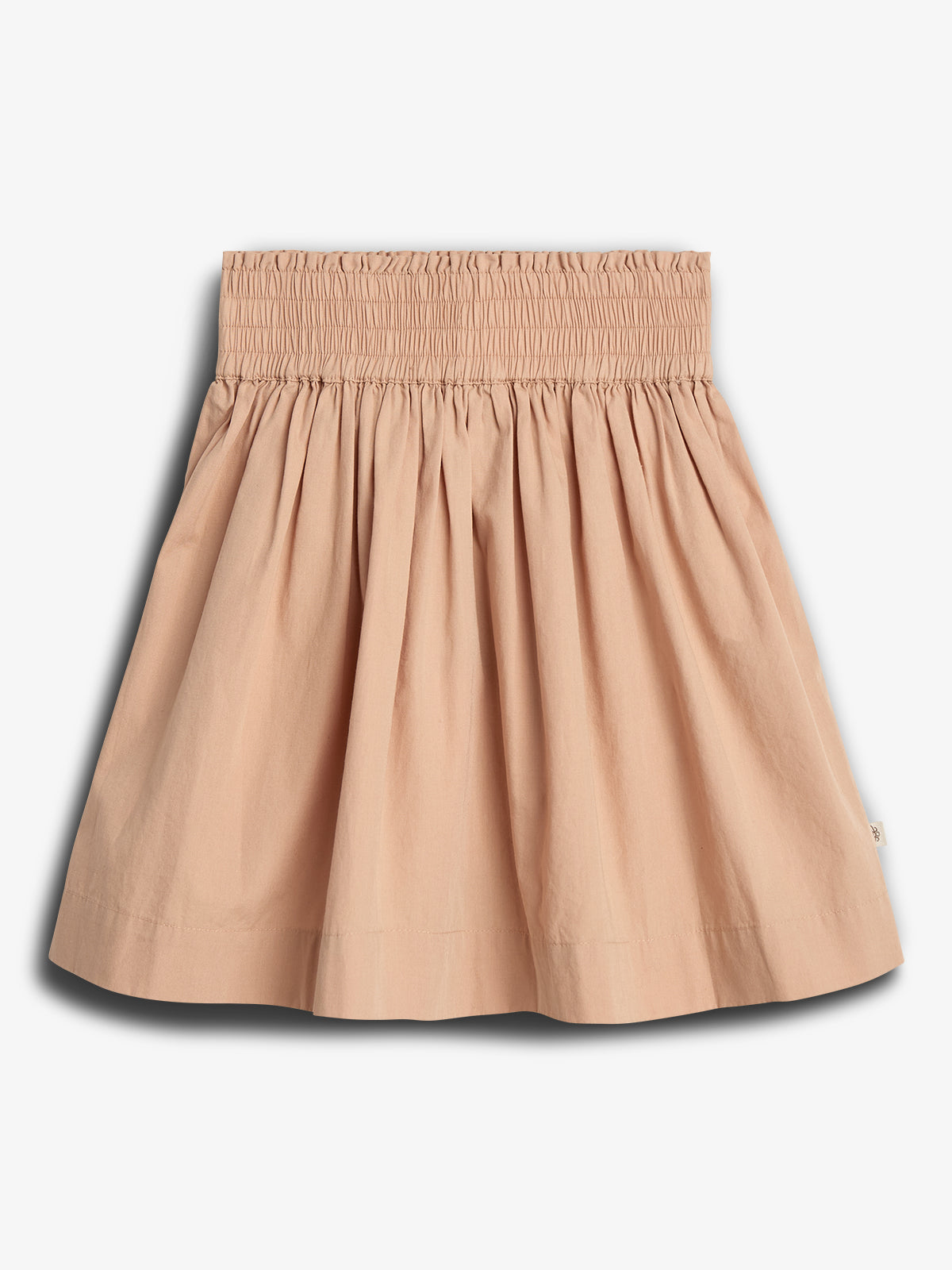 Beige skirt with a gathered, elastic waistband drapes gently, forming soft pleats. It is centered against a plain white background, highlighting its simple and elegant design.