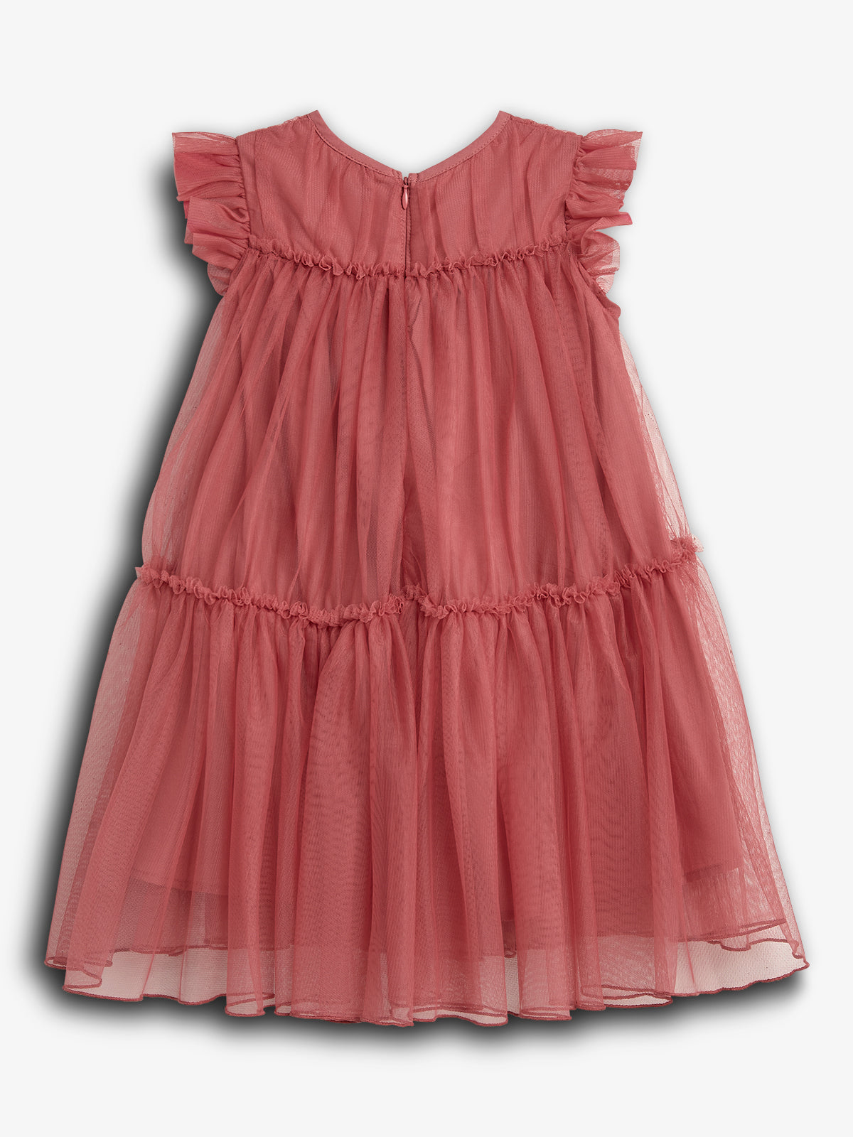 A pink, short-sleeved, ruffled dress with layered, flowing fabric is displayed against a plain, white background.