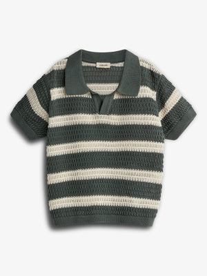 A short-sleeve knit polo shirt with alternating dark green and cream horizontal stripes is laid flat against a white background. A label reads "smallable" inside the collar.