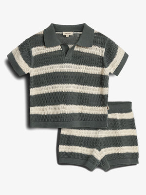 A knitted outfit features a short-sleeved collared shirt and shorts with green and white stripes. The label inside the shirt reads "pamelacute." Both pieces have a textured, open-knit design.