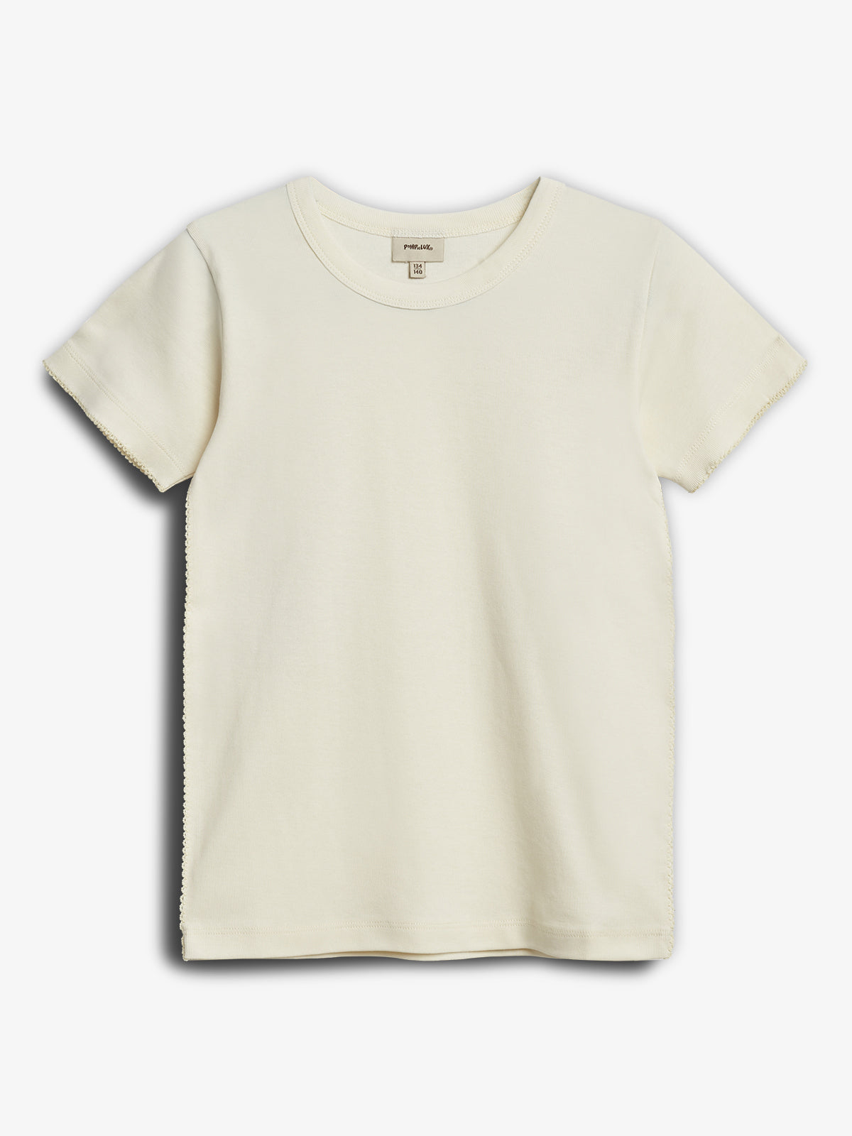 A plain, cream-colored T-shirt is lying flat on a white background. A visible tag inside the collar reads: "mini rodini 116/122."