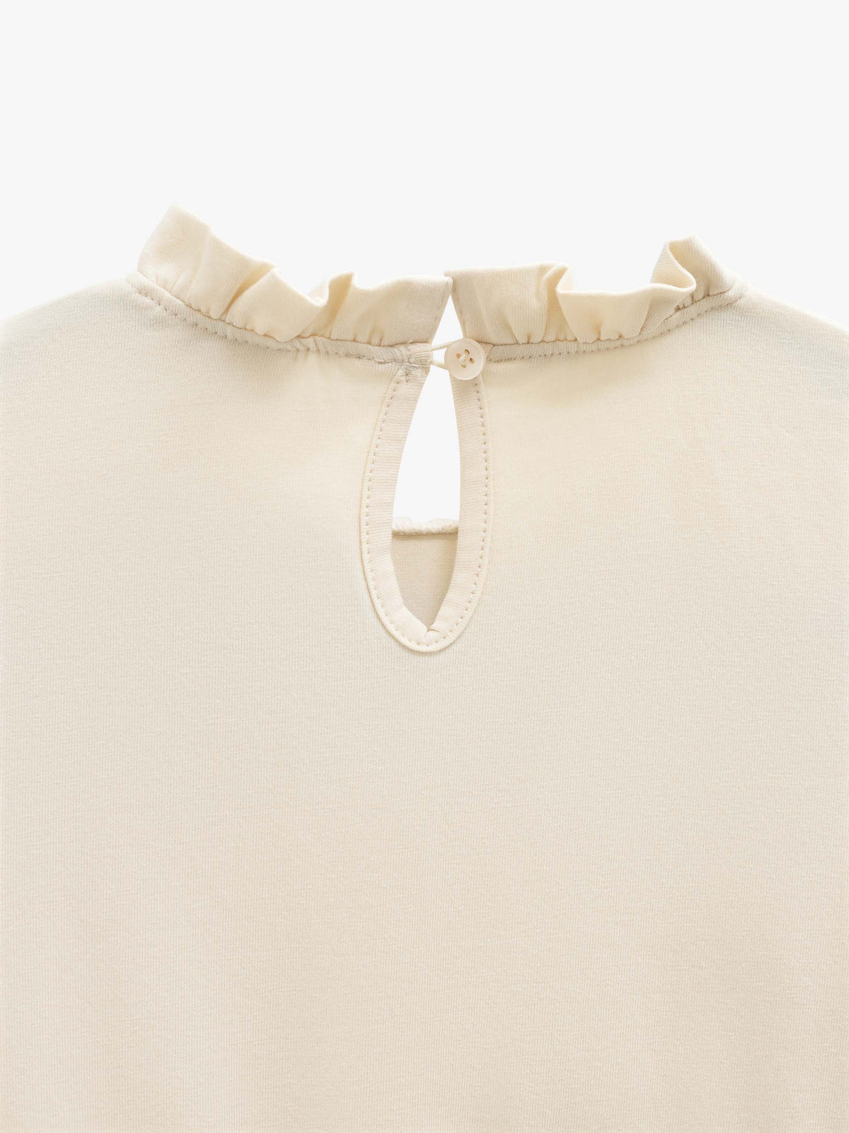 Einfarbige Jerseybluse mit Schößchen Kids - Offwhite | 101545 Heidi