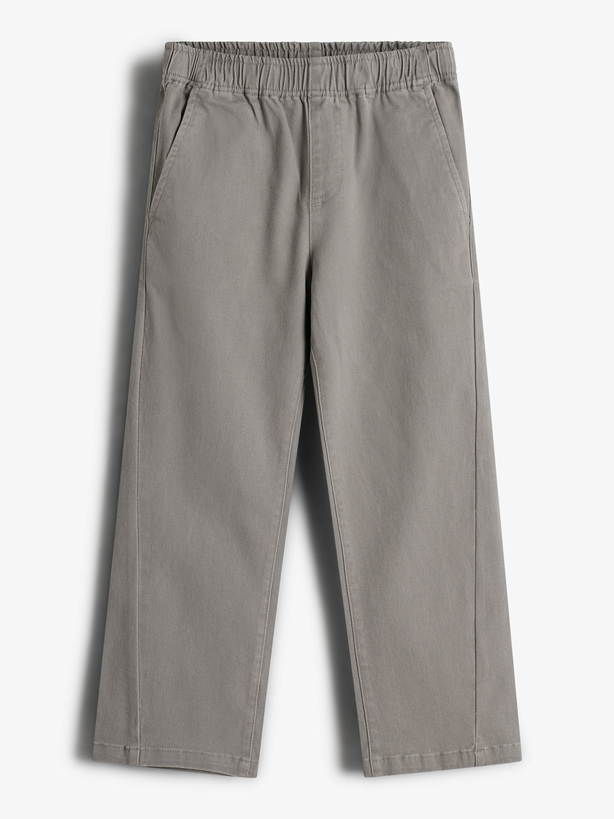 Graue Hose mit elastischem Bund hängt flach in der Luft; einfache, gerade Passform auf weißem Hintergrund ohne Dekorationen.