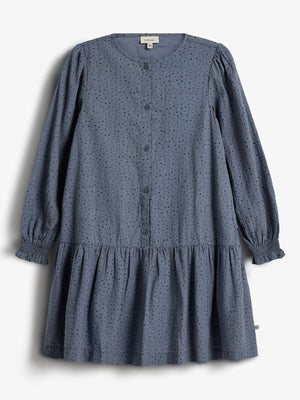 A blue, long-sleeve, button-up dress with a dotted pattern hangs against a white background. It features gathered cuffs and a ruffled hem. Text on the label reads "PRIMARK" and "10."