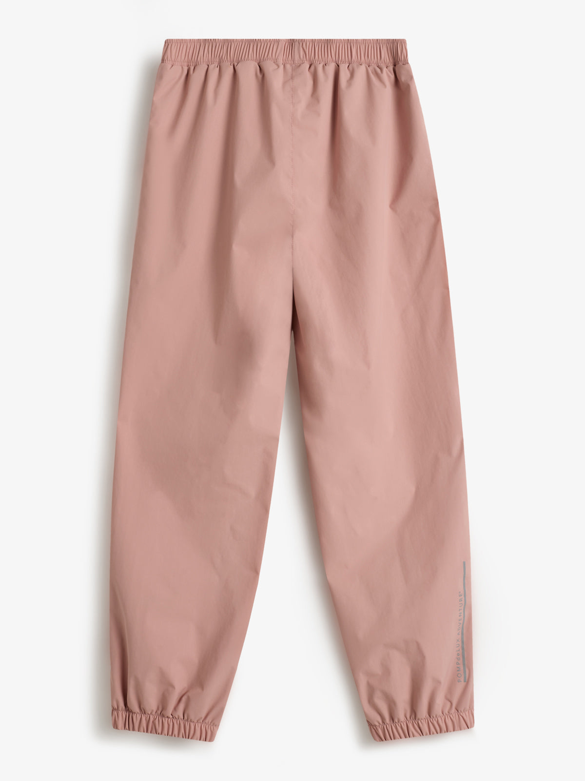 Eine rosa Hose liegt flach auf weißem Hintergrund. Sie hat elastische Bündchen an Taille und Knöcheln. Am unteren Rand ist der Text "POIVRE BLANC" zu sehen.